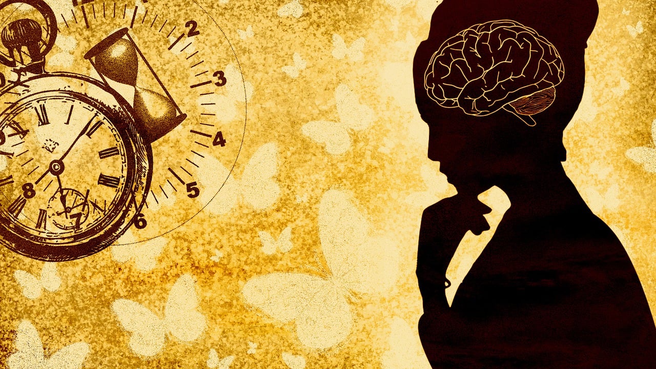 A silhouette of a woman with a clock and a brain.