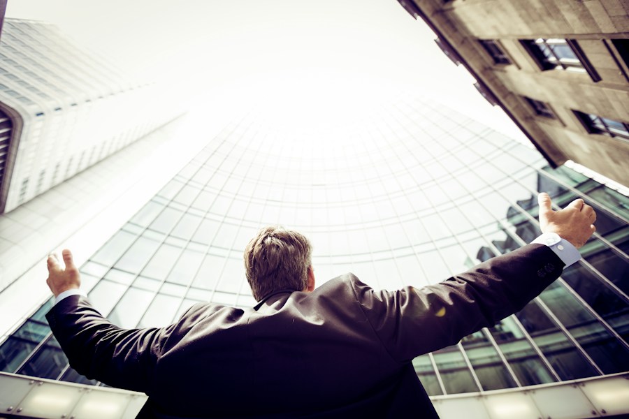 A man with his arms outstretched.