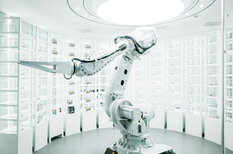 A robot is standing in a room full of shelves.