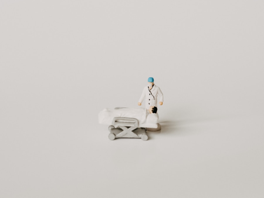 A figurine of a doctor on a bed.