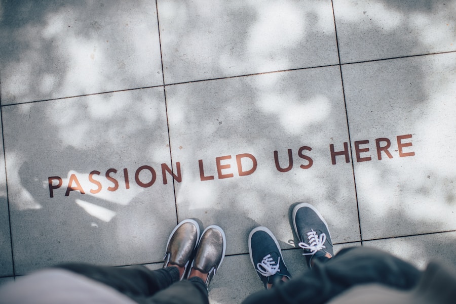 Two people standing over a sidewalk with the phrase "passion led us here" visible on the ground.