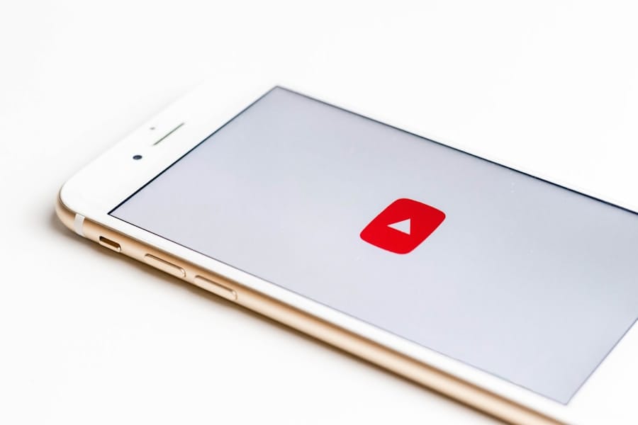 A smartphone screen displaying the YouTube logo.